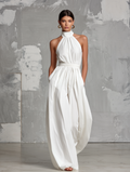 Zoltán | Tuta bianca elegante in tessuto intrecciato senza maniche con scollo halterneck • S1