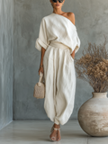 Set in lino bianco ottico da donna con top a spalle scoperte e pantaloni a taglio affusolato • S1