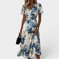 Linda | Vestito Midi a Fantasia Floreale con Cintura Avvolgente